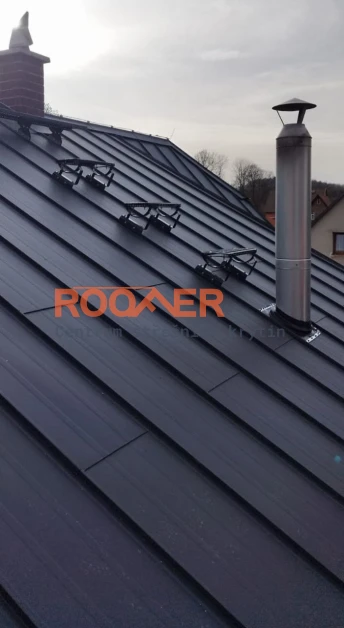 Rekonstrukce střechy ve Filipově – Click panely BILKA | ROOFER.cz Rekonstrukce střechy ve Filipově – Click panely BILKA | ROOFER.cz